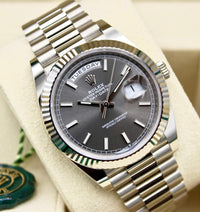 Rolex Day-Date 40 Presidential 228239 Fluted Bezel Dark Rhodium Stripe Motif Dial