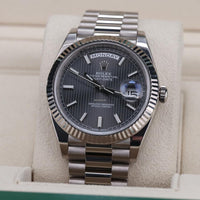 Rolex Day-Date 40 Platinum Presidential 228206 Smooth Bezel Dark Rhodium Stripe Motif Dial