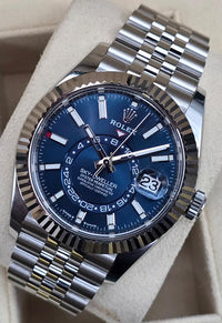 Rolex Sky Dweller Stainless Steel Blue Face 42mm W/G Fluted Bezel Jubilee 326934