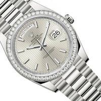 Rolex Day-Date 40 Presidential 228349RBR Diamond Bezel Silver Stripe Motif Dial