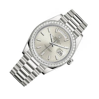 Rolex Day-Date 40 Presidential 228349RBR Diamond Bezel Silver Stripe Motif Dial
