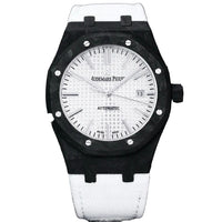 Audemars Piguet Royal Oak featuring a forged carbon fiber case and a white rubber strap.