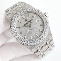 Audemars Piguet Royal Oak, specifically a "fully iced out" or "bust down" version.