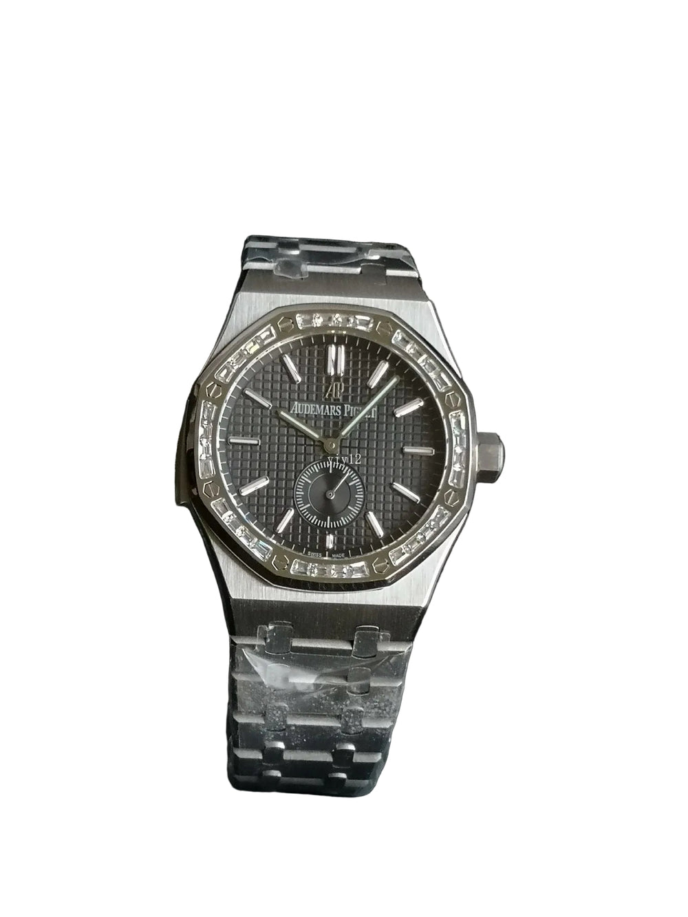 Audemars Piguet Royal Oak with a diamond-set bezel and small seconds sub-dial.