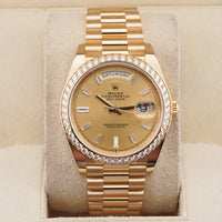 Rolex Day-Date 40 228348RBR Diamond Bezel Baguette Diamond Champagne Dial