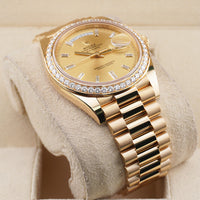 Rolex Day-Date 40 228348RBR Diamond Bezel Baguette Diamond Champagne Dial