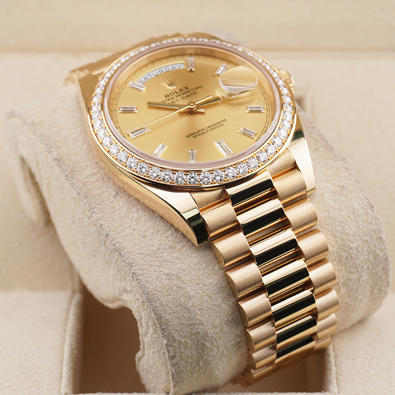 Rolex Day-Date 40 228348RBR Diamond Bezel Baguette Diamond Champagne Dial