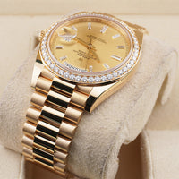 Rolex Day-Date 40 228348RBR Diamond Bezel Baguette Diamond Champagne Dial