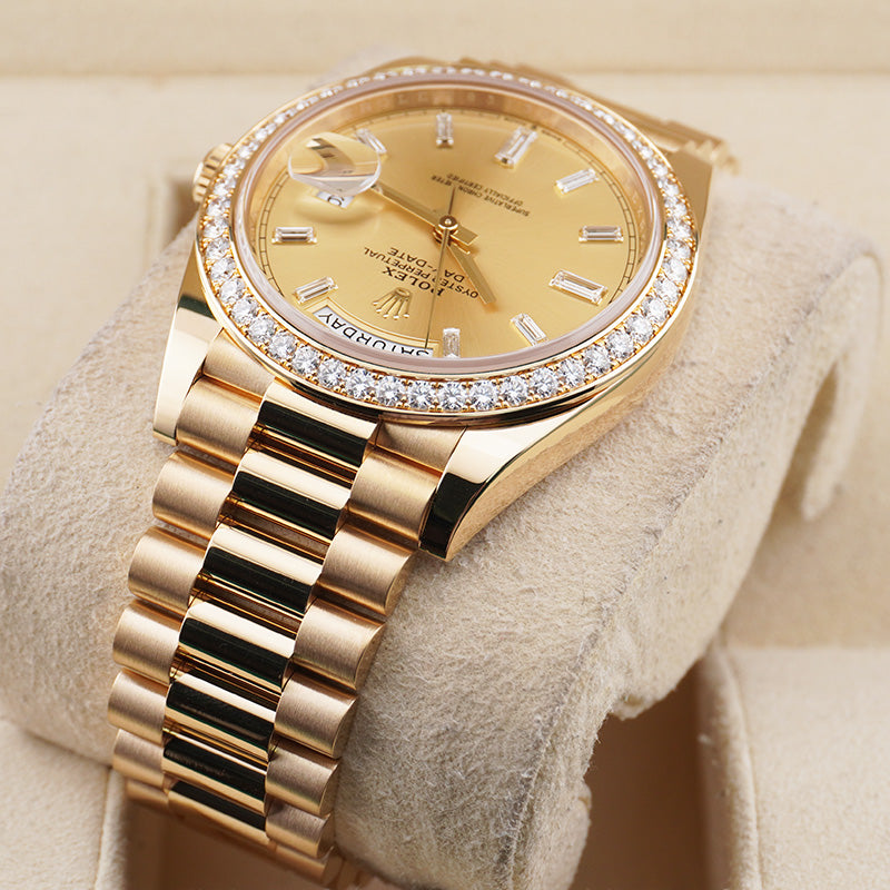 Rolex Day-Date 40 228348RBR Diamond Bezel Baguette Diamond Champagne Dial