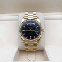 Rolex Day-Date 40 Presidential 228238 Fluted Bezel Baguette Diamond Black Dial