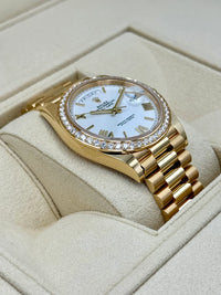 Rolex Day-Date 40 228398TBR Baguette Diamond Bezel White Dial