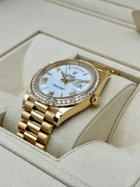 Rolex Day-Date 40 228398TBR Baguette Diamond Bezel White Dial