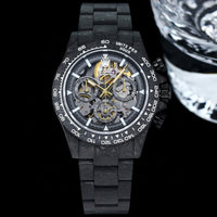 Rolex Cosmograph Daytona modified with a carbon fiber case and a skeletonized dial.