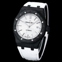 Audemars Piguet Royal Oak featuring a forged carbon fiber case and a white rubber strap.