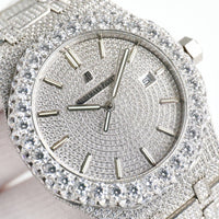 Audemars Piguet Royal Oak, specifically a "fully iced out" or "bust down" version.