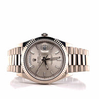 Rolex Day-Date 40 Presidential 228345RBR Diamond Bezel Sundust Stripe Motif Dial