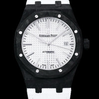 Audemars Piguet Royal Oak featuring a forged carbon fiber case and a white rubber strap.