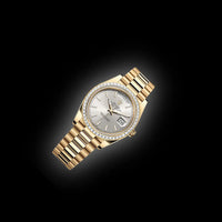 Rolex Day-Date 40 Presidential 228398TBR Baguette Diamond Bezel Silver Dial