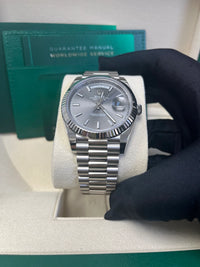Rolex Day-Date 40 Platinum Presidential 228206 Smooth Bezel Dark Rhodium Stripe Motif Dial