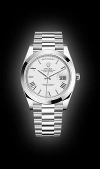 Rolex Day-Date 40 Platinum Presidential 228206 Smooth Bezel White Dial
