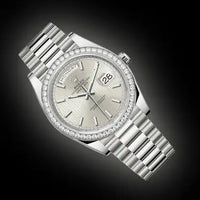 Rolex Day-Date 40 Presidential 228349RBR Diamond Bezel Silver Stripe Motif Dial