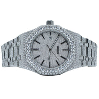 Audemars Piguet Royal Oak, specifically a "fully iced out" or "bust down" version.